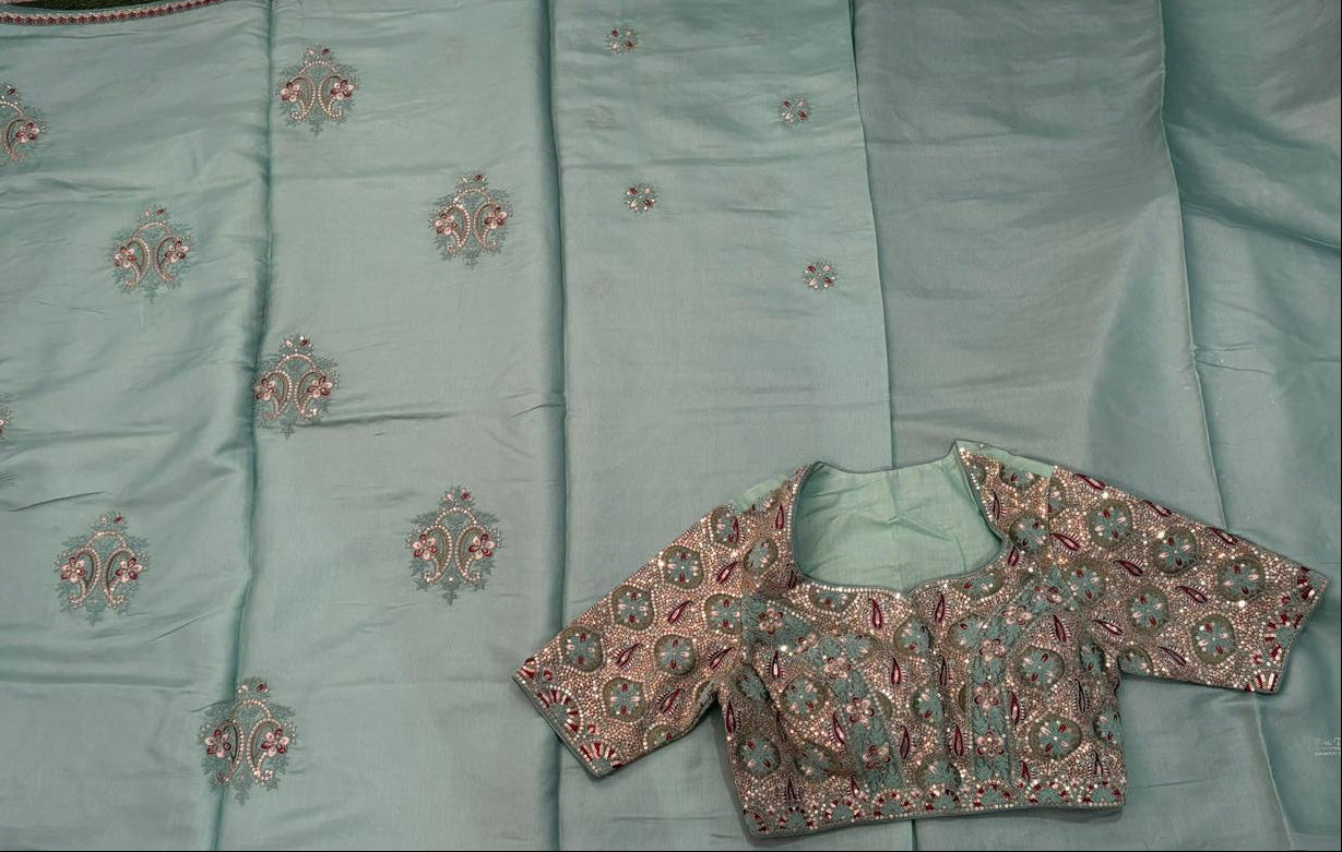Ethereal Seafoam Silk Saree With Intricate Floral Motifs  & A Pre-Stitched Blouse